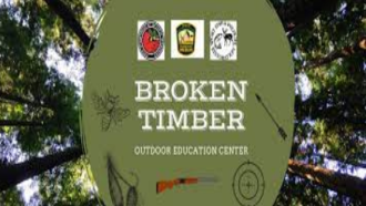 Circle saying Broken Timber Outdoor Education Center with pictures of gun, arrow, bee, crosshair, and fishing lure