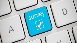 Computer key that says survey
